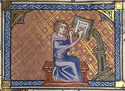 The author of a manuscript at his writing desk. 14th century