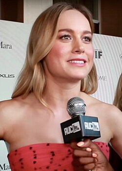 A head shot of Brie Larson as she looks away from the camera