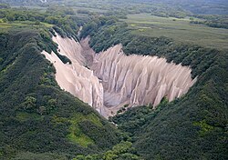 Kutkhiny Baty, a pumice rock formation outcrop located 4 km from the source of the Ozyornaya River (Lake Kurile), near the southern tip of the Kamchatka Peninsula, Russia