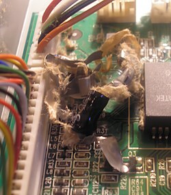 A capacitor that has exploded