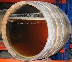 Film yeast on the surface of wine in a barrel of Vin jaune from the Jura wine region of France