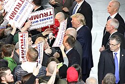 Trump and supporters attend a rally in Muscatine, Iowa, in January 2016