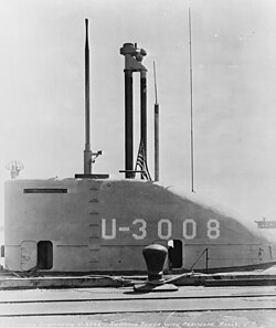 USS U-3008 (former German submarine U-3008) with her snorkel masts raised at Portsmouth Naval Shipyard, Kittery, Maine