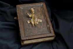 Decorative binding with figurehead of the 12th century manuscript Liber Landavensis