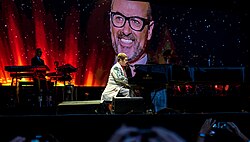 John performing a tribute to George Michael at Twickenham, London, in June 2017