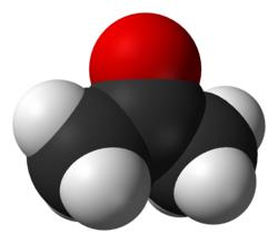 A ball structure of a molecule. Its backbone is a zig-zag chain of three carbon atoms connected in the center to an oxygen atom and on the end to 6 hydrogens.