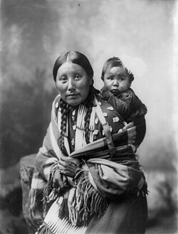 Portrait of Stella Yellow Shirt and her baby (Dakota, 1899)