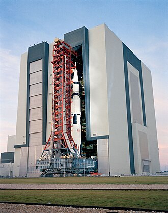 The Apollo 14 launch vehicle is rolled out from the Vehicle Assembly Building, November 9, 1970.