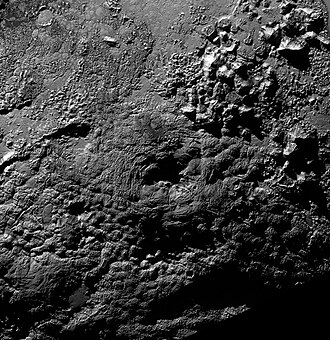 Wright Mons, a cryovolcano on Pluto