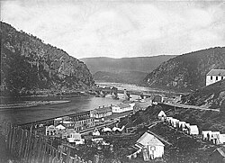 Harpers Ferry in 1865, looking east (downstream); the ruins of the musket factory can be seen in the center.