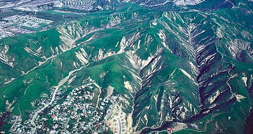 Scars formed by debris flow in Ventura, greater Los Angeles during the winter of 1983. The photograph was taken within several months of the debris flows occurring.[1]