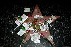 Pryor's star at the Hollywood Walk of Fame, covered with items left by fans