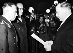 Generals Adolf Heusinger and Hans Speidel sworn into the newly founded Bundeswehr by Theodor Blank in November 1955