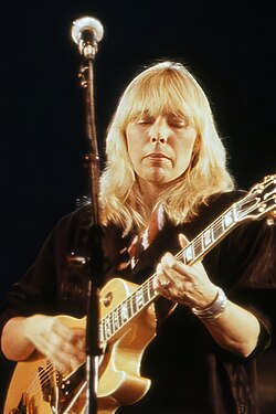 Mitchell performing in 1983