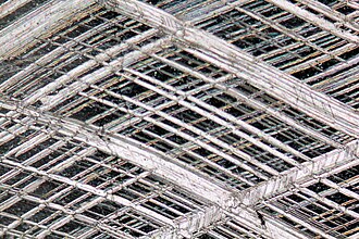 Regular twinning planes in calcite crystal. Crossed nicols image, magnification 10× (Field of view = 2 mm)