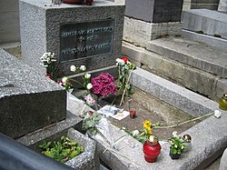 Jim Morrison's grave at the Père Lachaise Cemetery in Paris