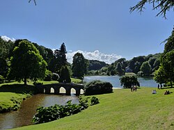 The landscape garden at Stourhead. Inspired by the great landscape artists of the seventeenth century, the landscape garden was described as a "living work of art" when first opened in the 1750s.[262]
