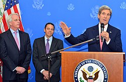 Kennard in 2013 (center) alongside U.S. Ambassador to NATO Ivo Daalder (left) and Secretary of State John Kerry (right)