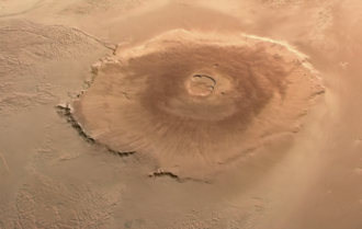 Picture of the tallest volcano on Mars, Olympus Mons. It is approximately 550 km (340 mi) across.