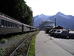 A tourist train arriving in Skagway at the cruise ship dock