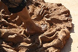 Preparation of clay for pottery in India