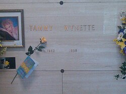 Wynette's final resting place at Woodlawn Memorial Park. The name on her grave was changed three times, eventually changed back to her stage name as pictured here.