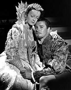 Davis with Errol Flynn in The Private Lives of Elizabeth and Essex (1939). At the time she played 60-year-old Elizabeth I, she was only 30 years old.[71]