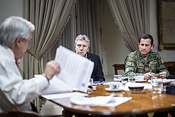 President Piñera with Minister Alberto Espina and the head of National Defense for the Metropolitan Region Javier Iturriaga del Campo.