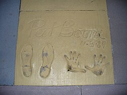 Boone's handprints and shoe prints in front of The Great Movie Ride at Disney World's Disney's Hollywood Studios
