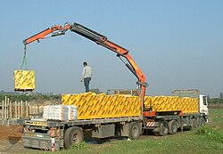 Loader crane using a jib extension