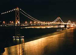 The San Francisco–Oakland Bay Bridge, a fictional squatted version of which constitutes the setting for Gibson's Bridge trilogy
