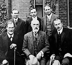 Front row: Sigmund Freud, G. Stanley Hall, Carl Jung. Back row: Abraham A. Brill, Ernest Jones, Sándor Ferenczi at Clark University in 1909.