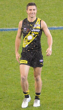 Liam Baker at a Dreamtime at the 'G match in 2019. During the Sir Doug Nicholls Round, players wear guernseys featuring specially commissioned artwork by an Indigenous artist