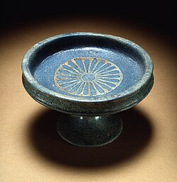 Copper was used in blue pigments like this "Egyptian blue" faience saucer and stand from the Bronze Age, New Kingdom of Egypt (1400–1325 BC).