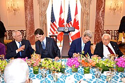 Colin Powell, Canadian prime minister Justin Trudeau, Secretary of State John Kerry, and Kissinger in March 2016