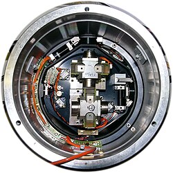A low-frequency 3-direction ocean-bottom seismometer (cover removed). Two masses for x- and y-direction can be seen, the third one for z-direction is below. This model is a CMG-40TOBS, manufactured by Güralp Systems Ltd and is part of the Monterey Accelerated Research System.