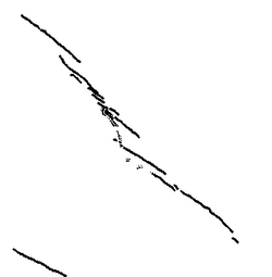 Simplified map of the en echelon dike set at Jagged Rock, Arizona, US. The total dike length is about 1.45 km.[8]