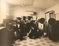 Luigi Russolo and his assistant Ugo Piatti in their Milan studio in 1913 with the Intonarumori (noise machines)
