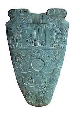 The Narmer Palette, depicting two monstrous serpopards representing unification of Upper and Lower Egypt, c. 3100 BC
