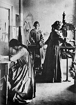 The Dun Emer Press in 1903 with Elizabeth Yeats working the hand press