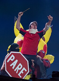 Comedian Stefan Kramer performing the "Primera Línea" at the Festival de Viña 2020, where he was harshly criticized by right-wing politicians for "praising and idealizing" violence.