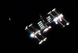 The ISS and HTV photographed from Earth by Ralf Vandebergh