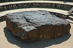 The 60-tonne (66-short-ton; 130,000-pound), 2.7 m (8 ft 10 in) Hoba meteorite in Namibia is the largest known intact meteorite.[1]