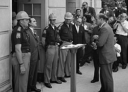 Alabama governor George Wallace tried to block desegregation at the University of Alabama and is confronted by U.S. Deputy Attorney General Nicholas Katzenbach in 1963.