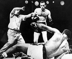 Ingemar Johansson of Sweden knocks out heavyweight champion Floyd Patterson on 26 June 1959