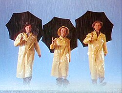 Gene Kelly, Donald O'Connor and Debbie Reynolds in Singin' in the Rain (1952)