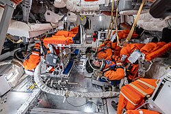 The crew of Artemis II training inside an Orion mock-up in January 2025