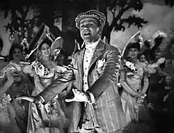 Cagney as George M. Cohan, performing "The Yankee Doodle Boy" from Yankee Doodle Dandy (1942)