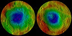 Northern (left) and southern (right) hemispheres. The "Snowman" craters are at the top of the left image; Rheasilvia and Veneneia (green and blue) dominate the right. Parallel troughs are seen in both. Colors of the two hemispheres are not to scale,[j] and the equatorial region is not shown.