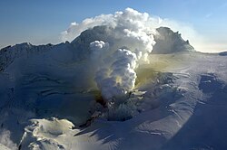 Fourpeaked Mountain with active fumaroles and sulfur deposits on February 22, 2007
